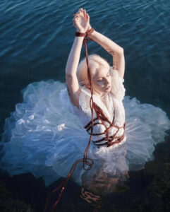 Japanese bondage - tied model in the water