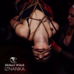 Shibari model with rope in her mouth